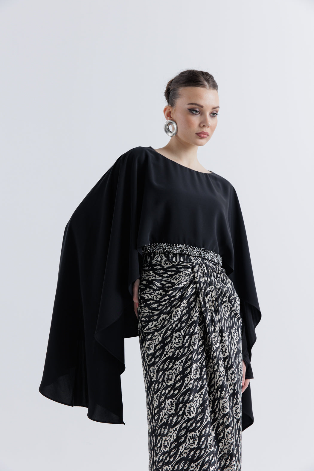 Flowing Cape Top with Elegant Embellishments