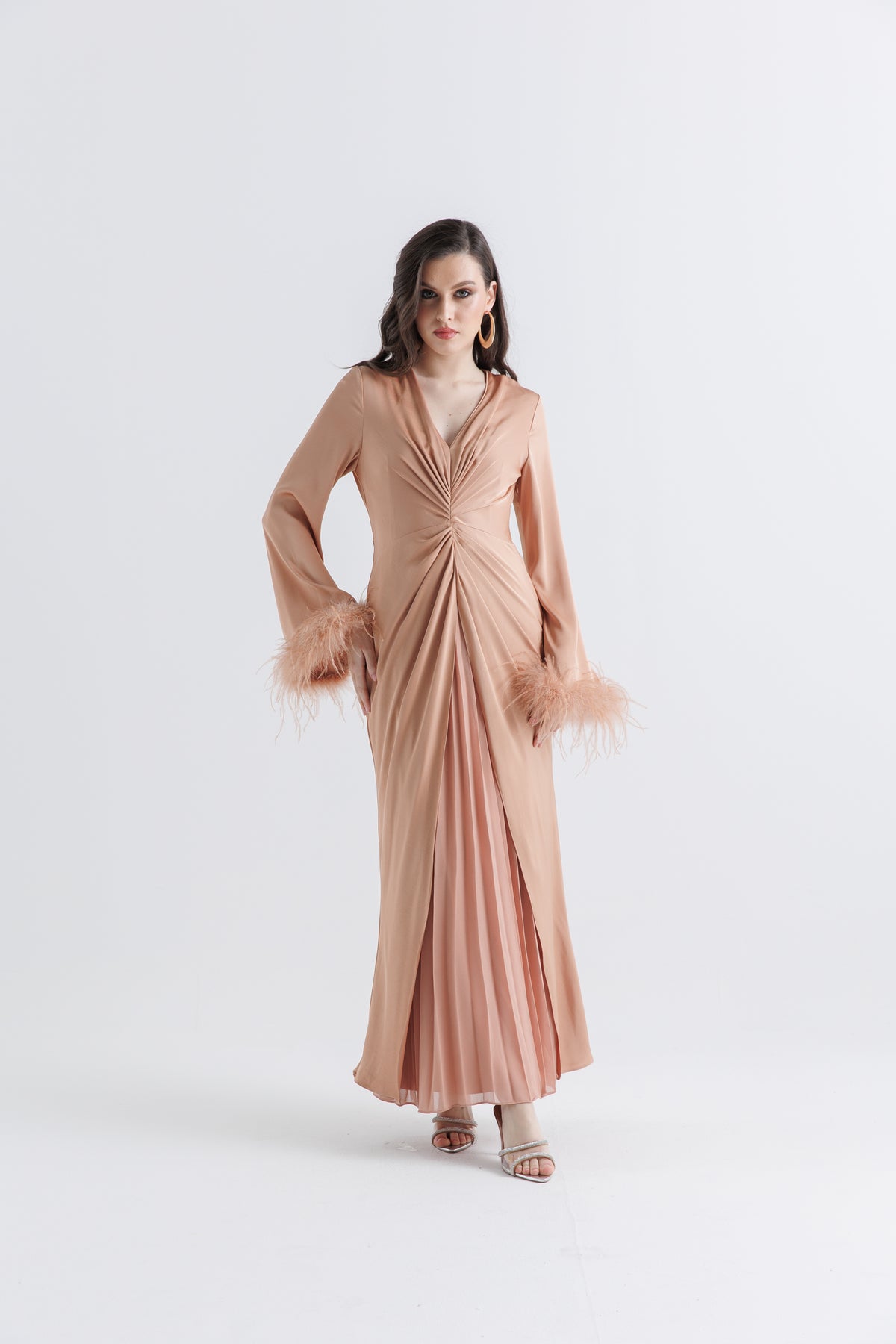 Timeless Elegance: Pleated Gown with Feather Cuffs